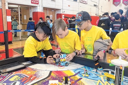 Four Mineola Middle School robotics club teams recently competed triumphantly at a LEGO League Robotics Tournament.
(Courtesy of Mineola Middle School)