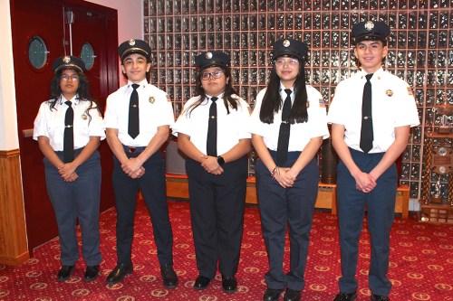 The new officers, from the left: Juliette Gonzales, Captain; Emet G, First Lieutenant; Elizabeth Mejia, Second Lieutenant; Analia Flores-Balam, Recording Secretary; and Angel Campos, Financial Secretary.