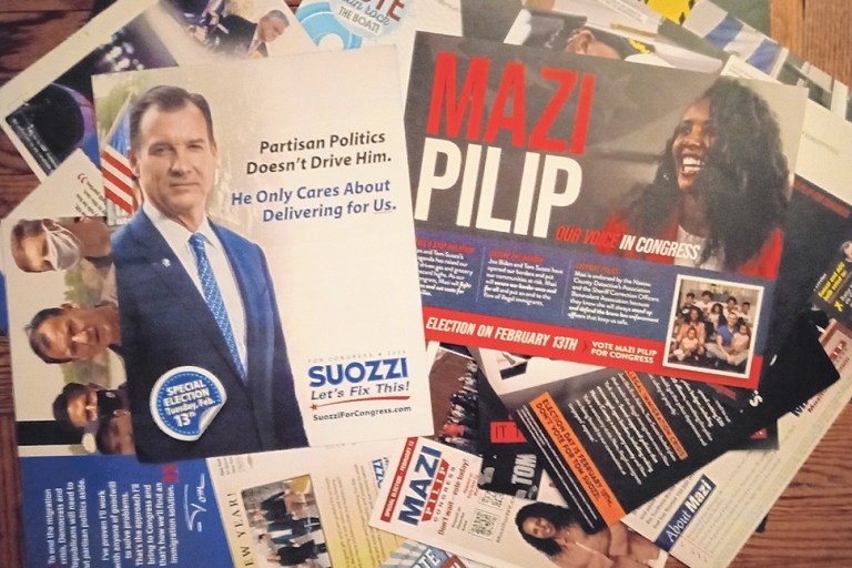 Campaign Flyers cover image Literature for Tom Suozzi and Mazi Pilip, as well as ‘attack ad’ mailers against Suozzi, has piled up. (Credit: Janet Burns)
