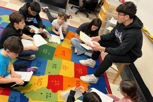 Colonial_B The Wheatley School seniors provided North Side School fourth-graders with a unique learning experience when they visited their classrooms. (Contributed photos)