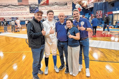 SCHOOLS_championship_022124_A Oyster Bay-East Norwich Superintendent of Schools Dr. Francesco Ianni, left, Luke Kugler, coach John Bruckner, Gabriella Sherlock and assistant coach Ian Bozsnyak.
(Photos courtesy the Oyster Bay-East Norwich Central School District)
