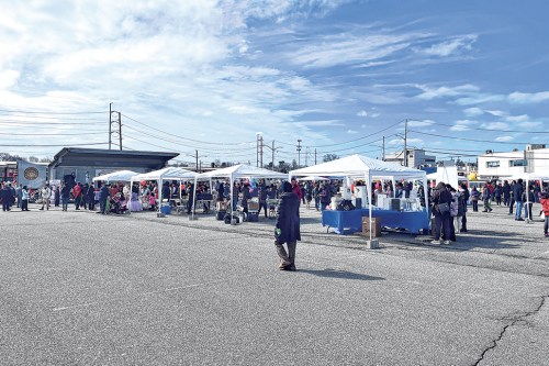 The ABI Health Care Lunar New Year Float Parade and Asian Food Festival was held at 
the Syosset LIRR station. (Photos by Jennifer Corr)