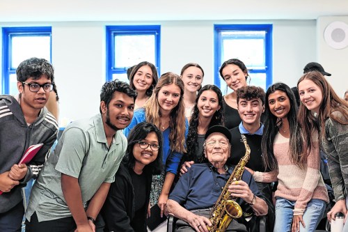 VeteransVisit_B WWII veteran and musician Dominick Critelli with Herricks High School students. (Contributed photos)