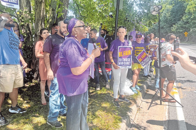 WOOD_nursinghome_081623_A Polly Henry, a 1199SEIU clerk, speaking out at the rally in front of Cold Spring Hills
Center for Nursing & Rehabilitation. (Photos by Jennifer Corr)