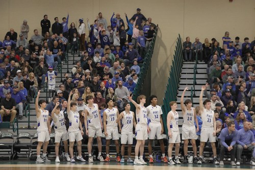 Vikings Basketball cheering on their team