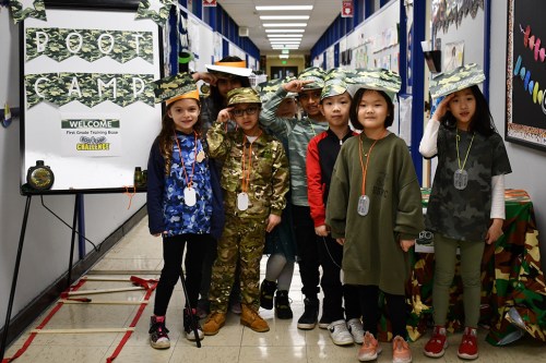 BootCamp_A First graders at Searingtown School are ready to take on capitalization and punctuation as part of grammar boot camp. (Contributed photos)