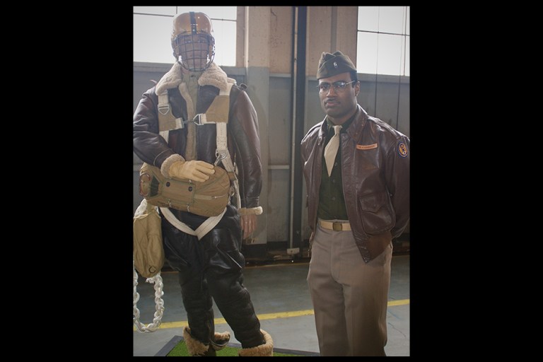 Tuskegee_Cover Nick Casseus led the presentation on the Triple Nickles and aided in the unveiling of the model parachuter for the exhibit. (Photo credit: Lauren Feldman)