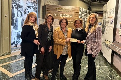 Shireinu Choir of Long Island presents a check to representatives of the Holocaust Memorial & Tolerance Center of Nassau County. Pictured from the left: Shireinu Board Member Jemi Goldstein; Shireinu Founding Musical Director Deborah Tartell; Shireinu Choir of Long Island Co-President Sherry Husney; Holocaust Memorial & Tolerance Center Executive Director Moji Pourmoradi; Director of Events and Fundraising Bali Lerner. (Contributed photo)