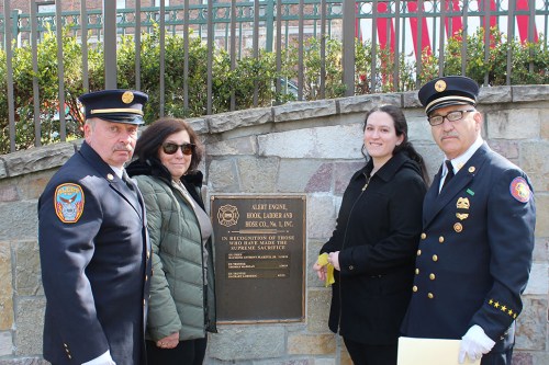 From the left: Alert Fire Company Chief John Purcell; Lobodzic’s wife, Debbie, and daughter, Jennifer Lobodzic ; and Alert Fire Company 
President James Neubert