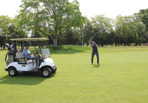 Golfers on the green.