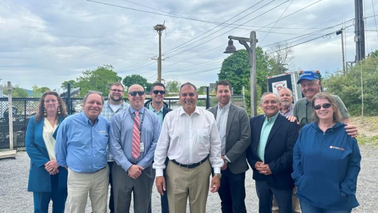 Oyster Bay Town Supervisor Joseph Saladino Joins PSEG Long Island Team, including Vinny Frigeria, Regional Public Affairs Manager, Lisanne Altmann, Co-President of the PSEG Long Island Environmental Guardian, Michael Presti, Director of Customer Experience, Michael Mclaughlin, Senior Distribution Operations Supervisor, Elizabeth Flagler, Head of Internal and External Communications, and John Stalzer, Environmental Regulation Procedures and Training Specialist, along with Jim Jones of the Bayville Environmental Conservation Committee, at the New Osprey Nest Near the Western Waterfront in Oyster Bay (Photo from the Town of Oyster Bay)