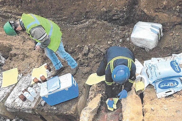 A team excavating contaminated drums. (Photos courtesy of the Town of Oyster Bay)
