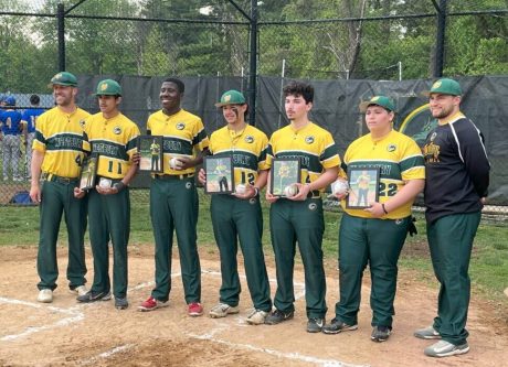 Omar Ahmad Ventura (#11), Spencer Sossous (#33), Alex Munguia (#12), Ryan Alvarez (#4), and Miguel Reyes (#22) pose with their coaches on a triumphant Senior Day.
(Credit: Joe Morreale)