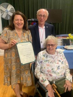 North Hempstead Town Councilmember Mariann Dalimonte presents a Proclamation of Recognition to Alan and Sue Dinn (Photo from the Town of North Hempstead)