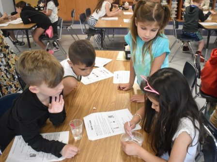Students mixed baking soda and water to make a simulated duck egg. (Contributed photo)