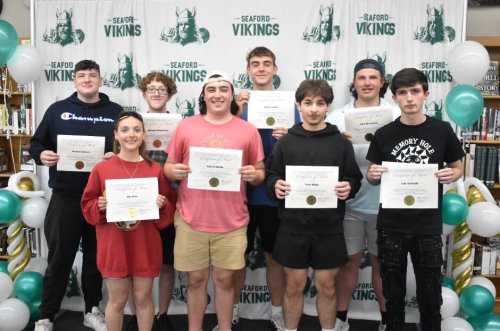 Seaford High School held a ceremony to recognize the first graduates from its Electrical Training Center. (Photo courtesy of the Seaford School District)