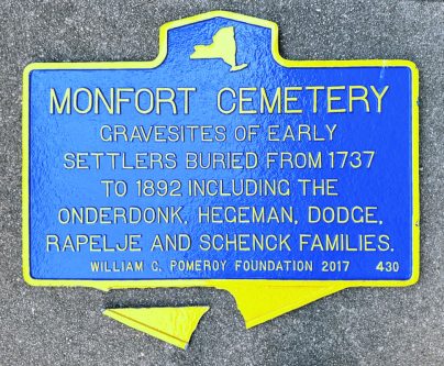 The Monfort Cemetery plaque was vandalized in mid-May (Photo from the Cow Neck Peninsula Historical Society)