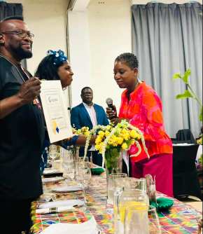 Westbury Church_A Legislator Bynoe congratulating Rev. Sylvester (Photo from the office of the Nassau County Legislature)