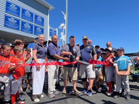 ClubHouse_A Supervisor Saladino helps cut the ribbon during the opening of an upgraded clubhouse for ball players at John J. Burns Park. (Photos courtesy of the Town of Oyster Bay)