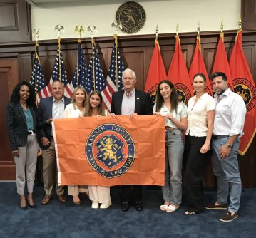 Nassau County Executive Bruce Blakeman and Legislator Mazi Pilip (R-Great Neck) honored Giselle Branchinelli and Allie Acera, of Manhasset, and their parents for the two students’ trip to Hawaii to help rebuild from the wildfires. (Photo by Craig Low)