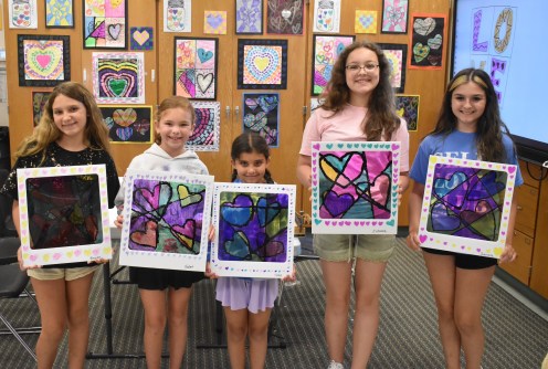 Arts Camp 6 Repurposing old desk shields, students in the art with hearts class created stained-glass window designs.
(Photos courtesy of the Massapequa School District)