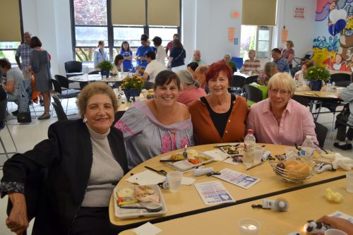 Senior citizens enjoy a wonderful free luncheon and music during Pride in Port Senior Luncheon. (Photo courtesy of the Pride in Port Committee)