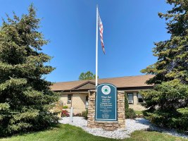 Senator Martins defends variances of local resident at East Hills meeting