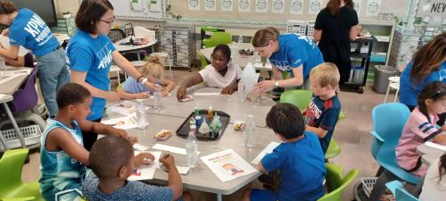 Volunteer Day 1 KPMG volunteers collaborated with students from Farmingdale to craft calming jars during Community Impact Day. (Pictures courtesy of the Farmingdale School District)