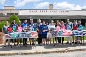 DeRiggi-Whitton and county police give away over 500 backpacks