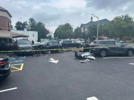 Driver dies after crashing into North Shore Farms parking lot