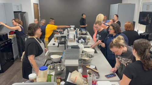 Deaf and blind participants using the newly renovated kitchen (Photos from Helen Keller Services)