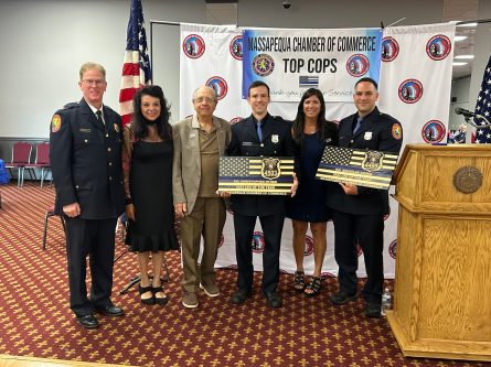 Officer of the Year Police Officers Christopher Ryder, center, and Nicholas Russo, right, were honored by the Massapequa Chamber of Commerce. (Photo credit Lauren Feldman)