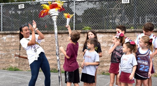 GH-Torch12 Students line up to light their torch (Photos provided by North Shore Central School District)