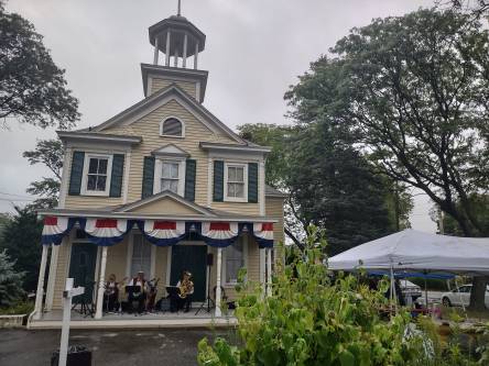 The museum festooned with patriotic bunting, hosting the Banjo Rascals. (Photos courtesy of the Hicksville Historical Society)