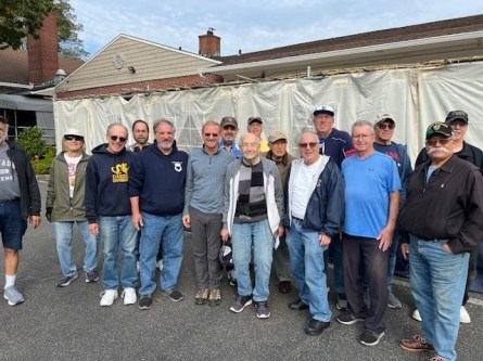 The Men’s Club was proud of their Sukkah construction. (Photo courtesy of Dave Kamlet)