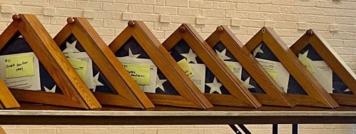 Dozens of unclaimed burial flags are entrusted to volunteer custodians. (Christy Hinko)