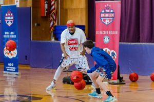 Corey ‘The Dribbler’ speaks at James H. Vernon School